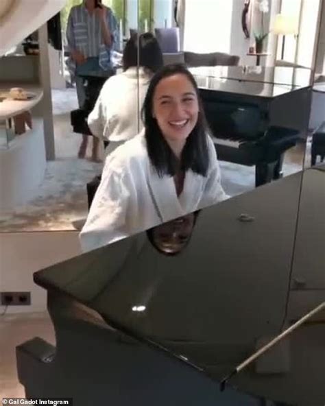 gal Gadot playing piano